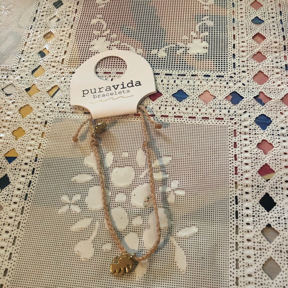 Pure Aveda palm leaf charm bracelet